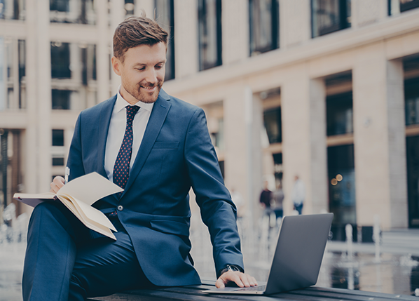 mployee-on-laptop-outdoors